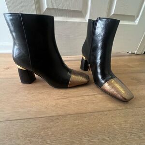 Stylish Black Ankle Boots with Gold Toe